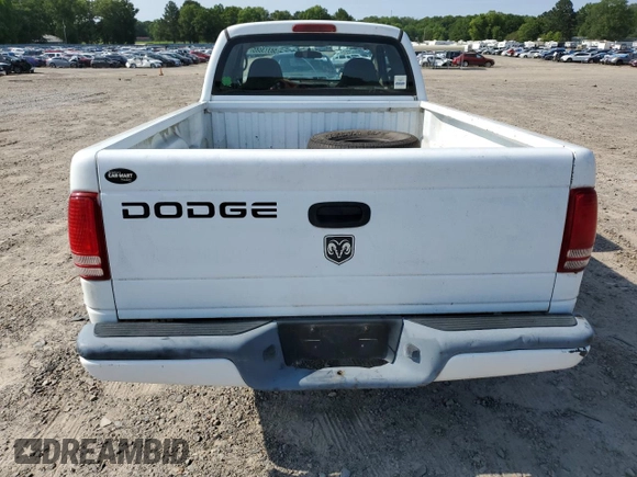 2001 Dodge Dakota z VIN 1B7GL22X21S128774, wystawiony jako Copart lot #58313685 z przebiegiem 167 355 mil mil oraz Czysty tytuł • Clean title. Historia ofert i sprzedaży dostępna na DreamBid. Obrazek 6.