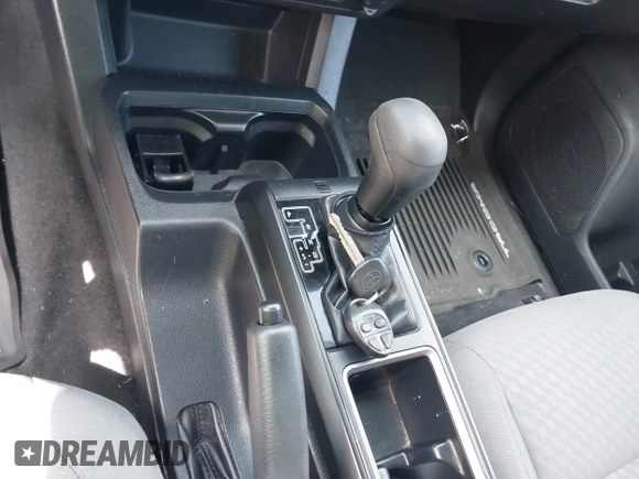 2020 Toyota Tacoma SR with VIN 3TYRX5GN0LT001284, listed as a IAAI auction lot 41888761 with 52,466 mi miles and . Bid and sale history available at DreamBid. Image 11.