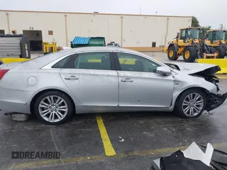 2019 Cadillac XTS Luxury z VIN 2G61M5S30K9116095, wystawiony jako IAAI lot #41352885 z przebiegiem 2687 mil mil oraz . Historia ofert i sprzedaży dostępna na DreamBid. Obrazek 13.