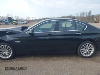 2014 BMW 5 Series 528i xDrive with VIN WBA5A7C52ED616976, listed as a IAAI auction lot 42067334 with 98,286 mi miles and . Bid and sale history available at DreamBid. Image 14.