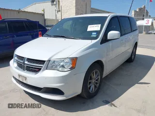 2015 Dodge Grand Caravan SE with VIN 2C4RDGBG9FR691462, listed as a IAAI auction lot 42197050 with 124,239 mi miles and . Bid and sale history available at DreamBid. Image 2.