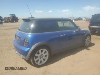 2005 MINI Hardtop S with VIN WMWRE33415TD90833, listed as a Copart auction lot 61238165 with 174,647 mi miles and Salvage title. Bid and sale history available at DreamBid. Image 3.