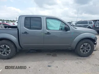 2016 Nissan Frontier SV z VIN 1N6AD0ER0GN763193, wystawiony jako IAAI lot #42137941 z przebiegiem 118 660 mil mil oraz . Historia ofert i sprzedaży dostępna na DreamBid. Obrazek 13.