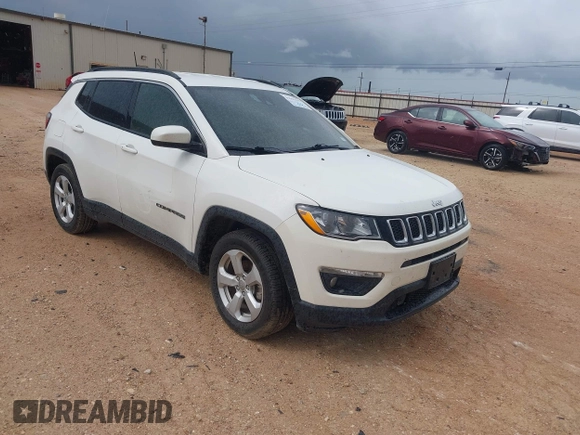 2019 Jeep Compass Latitude with VIN 3C4NJCBB3KT802907, listed as a IAAI auction lot 42595157 with 103,993 mi miles and . Bid and sale history available at DreamBid. Image 1.