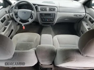 2006 Ford Taurus SE z VIN 1FAFP532X6A186042, wystawiony jako Copart lot #54409375 z przebiegiem 145 687 mil mil oraz Szkody całkowita. Historia ofert i sprzedaży dostępna na DreamBid. Obrazek 8.