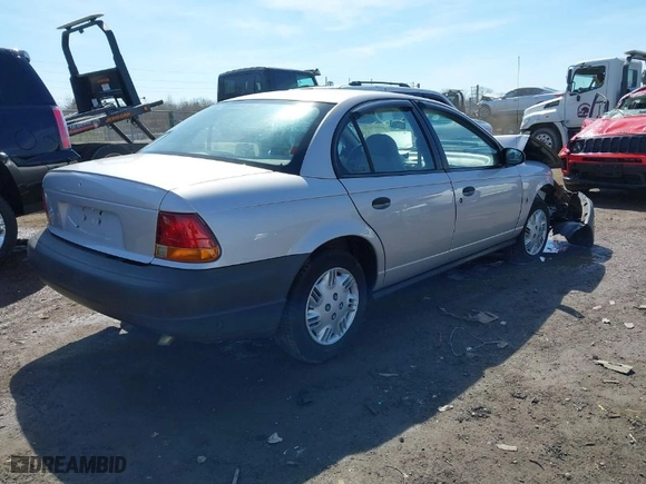 1999 Saturn SL with VIN 1G8ZH5281XZ376254, listed as a IAAI auction lot 41857372 with 229,836 mi miles. Bid and sale history available at carsss.com. Image 4.