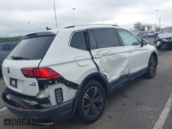 2018 Volkswagen Tiguan SEL with VIN 3VV2B7AX4JM012840, listed as a IAAI auction lot 42263511 with 105,510 mi miles and . Bid and sale history available at DreamBid. Image 4.