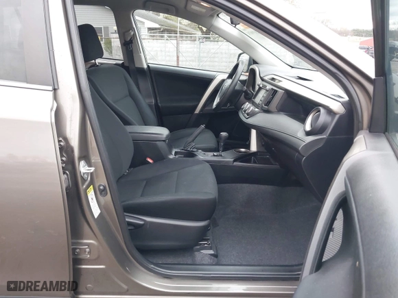2015 Toyota RAV4 LE with VIN 2T3BFREV1FW245801, listed as a IAAI auction lot 42039074 with 129,181 mi miles. Bid and sale history available at carsss.com. Image 5.