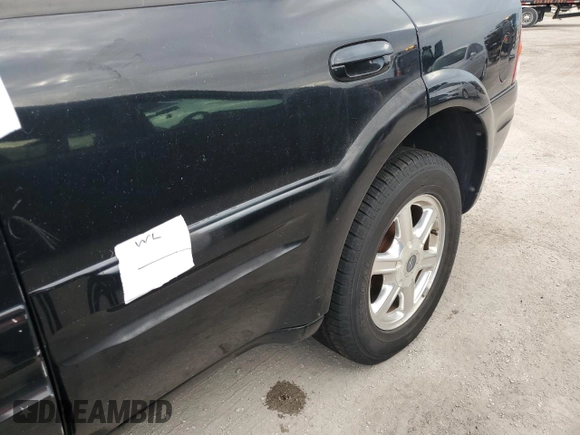 2003 Oldsmobile Bravada z VIN 1GHDT13S632357164, wystawiony jako Copart lot #75089244 z przebiegiem Nie podano mil oraz Szkody całkowita. Historia ofert i sprzedaży dostępna na DreamBid. Obrazek 13.