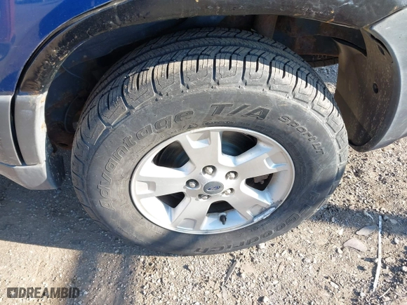 2007 Ford Escape XLT with VIN 1FMYU93137KA13657, listed as a IAAI auction lot 42060707 with 118,580 mi miles. Bid and sale history available at carsss.com. Image 12.