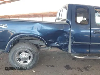 2003 Ford F-150 XL with VIN 1FTRX18W13NB44407, listed as a IAAI auction lot 42559740 with 281,702 mi miles and . Bid and sale history available at DreamBid. Image 6.