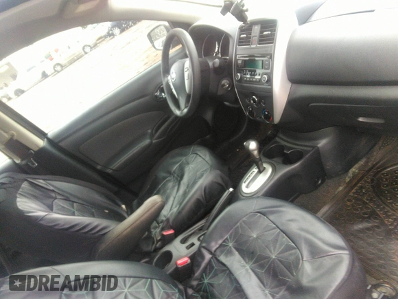 2015 Nissan Versa SV with VIN 3N1CN7AP7FL869485, listed as a IAAI auction lot 42077524 with 198,646 mi miles. Bid and sale history available at carsss.com. Image 5.