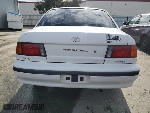 1992 Toyota Tercel z VIN JT2EL43B0N0152801, wystawiony jako Copart lot #43838825 z przebiegiem 81 697 mil mil oraz Tytuł czysty. Historia ofert i sprzedaży dostępna na DreamBid. Obrazek 6.