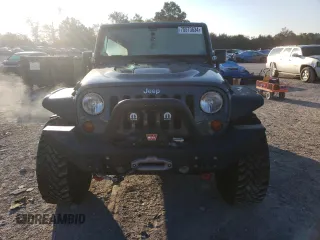2013 Jeep Wrangler Unlimited Rubicon 10th Anniversary z VIN 1C4HJWFG0DL704100, wystawiony jako Copart lot #75573634 z przebiegiem 103 158 mil mil oraz Szkoda całkowita • Salvage title. Historia ofert i sprzedaży dostępna na DreamBid. Obrazek 5.
