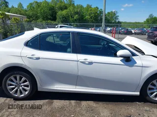2019 Toyota Camry LE with VIN 4T1B11HK2KU187475, listed as a IAAI auction lot 42192293 with 44,413 mi miles and . Bid and sale history available at DreamBid. Image 13.