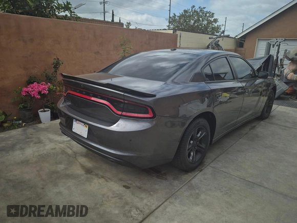 2020 Dodge Charger SXT with VIN 2C3CDXBG7LH232748, listed as a IAAI auction lot 42168856 with 26,527 mi miles. Bid and sale history available at carsss.com. Image 4.