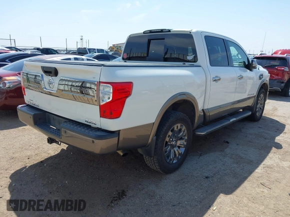 2017 Nissan Titan SV with VIN 1N6AA1E5XHN532587, listed as a IAAI auction lot 42019155 with 90,496 mi miles and . Bid and sale history available at DreamBid. Image 4.
