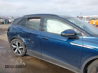 2023 Volkswagen ID.4 S z VIN 1V25MPE85PC057934, wystawiony jako IAAI lot #41135412 z przebiegiem 13 684 mil mil oraz . Historia ofert i sprzedaży dostępna na DreamBid. Obrazek 6.