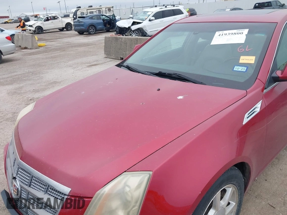 2008 Cadillac CTS RWD w/1SA with VIN 1G6DF577680197352, listed as a IAAI auction lot 41939800 with 188,667 mi miles. Bid and sale history available at carsss.com. Image 6.