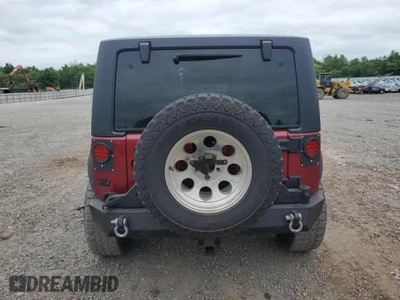 2012 Jeep Wrangler Sport z VIN 1C4AJWAG7CL105511, wystawiony jako Copart lot #62822985 z przebiegiem 137 520 mil mil oraz Czysty tytuł • Clean title. Historia ofert i sprzedaży dostępna na DreamBid. Obrazek 6.