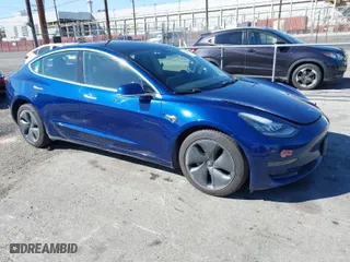 2019 Tesla Model 3 Mid Range with VIN 5YJ3E1EA8KF436086, listed as a IAAI auction lot 41682093 with 70,332 mi miles. Bid and sale history available at carsss.com. Image 1.