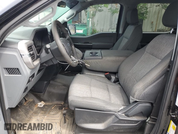 2022 Ford F-150 XL with VIN 1FTFW1E51NFA04887, listed as a Copart auction lot 55734705 with 123,590 mi miles and Salvage title. Bid and sale history available at DreamBid. Image 7.