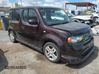 2009 Nissan Cube S z VIN JN8AZ28RX9T115567, wystawiony jako IAAI lot #42255387 z przebiegiem 99 162 mil mil oraz . Historia ofert i sprzedaży dostępna na DreamBid. Obrazek 1.