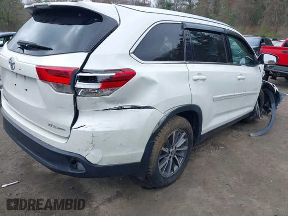 2019 Toyota Highlander SE with VIN 5TDJZRFH3KS629568, listed as a IAAI auction lot 42037373 with 93,358 mi miles and . Bid and sale history available at DreamBid. Image 4.