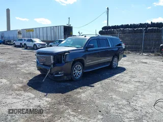2015 GMC Yukon XL Denali with VIN 1GKS2JKJ5FR144991, listed as a IAAI auction lot 41877853 with 167,814 mi miles. Bid and sale history available at carsss.com. Image 18.