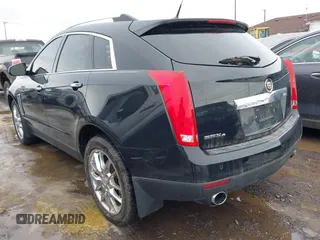 2013 Cadillac SRX Performance Collection with VIN 3GYFNHE33DS527519, listed as a IAAI auction lot 41652822 with 201,580 mi miles. Bid and sale history available at carsss.com. Image 3.
