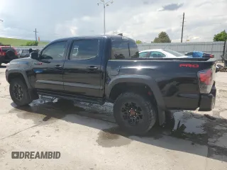2019 Toyota Tacoma SR with VIN 5TFCZ5ANXKX184626, listed as a Copart auction lot 59220905 with 123,746 mi miles and Salvage title. Bid and sale history available at DreamBid. Image 2.