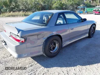 1992 Nissan 240SX z VIN JN1MS34P9NW100593, wystawiony jako IAAI lot #40867667 z przebiegiem Nie podano mil oraz . Historia ofert i sprzedaży dostępna na DreamBid. Obrazek 4.