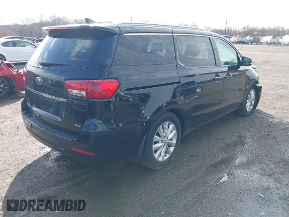 2017 Kia Sedona EX with VIN KNDMC5C18H6260441, listed as a IAAI auction lot 41797159 with 77,309 mi miles. Bid and sale history available at carsss.com. Image 4.
