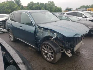 2024 BMW X5 xDrive40i with VIN 5UX23EU02R9T63818, listed as a Copart auction lot 60195525 with 26,773 mi miles and Salvage title. Bid and sale history available at DreamBid. Image 4.