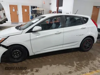 2016 Hyundai Accent SE z VIN KMHCT5AE1GU252785, wystawiony jako IAAI lot #41663000 z przebiegiem 104 656 mil mil oraz . Historia ofert i sprzedaży dostępna na DreamBid. Obrazek 14.