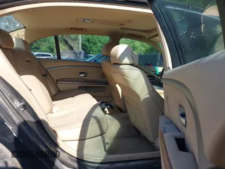 2004 BMW 7 Series 745Li with VIN WBAGN63594DS54487, listed as a IAAI auction lot 42497386 with 125,813 mi miles and . Bid and sale history available at DreamBid. Image 8.