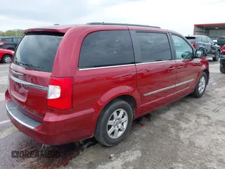 2012 Chrysler Town & Country Touring with VIN 2C4RC1BG8CR344068, listed as a IAAI auction lot 41970494 with 130,559 mi miles. Bid and sale history available at carsss.com. Image 4.