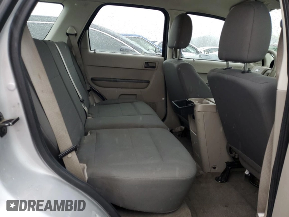 2010 Ford Escape XLS с VIN 1FMCU0C77AKD47899, выставлен на аукционе Copart как лот 45043535 с пробегом Не указан миль и Списание • Salvage title. История ставок и продаж доступна на DreamBid. Изображение 12.