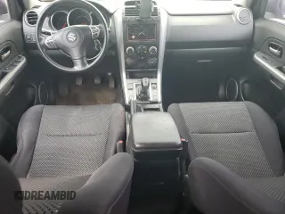 2006 Suzuki Grand Vitara z VIN JS3TE941764101657, wystawiony jako Copart lot #54943205 z przebiegiem 206 744 mil mil oraz Szkody całkowita. Historia ofert i sprzedaży dostępna na DreamBid. Obrazek 8.