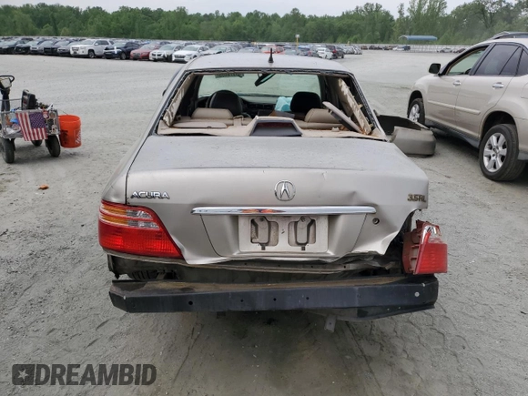 2002 Acura RL z VIN JH4KA96502C009276, wystawiony jako Copart lot #53978405 z przebiegiem 221 090 mil mil oraz Szkoda całkowita • Salvage title. Historia ofert i sprzedaży dostępna na DreamBid. Obrazek 6.