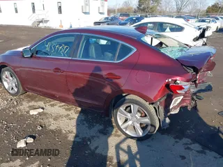 2015 Acura ILX Premium z VIN 19VDE2E58FE000288, wystawiony jako IAAI lot #41344397 z przebiegiem 99 297 mil mil oraz . Historia ofert i sprzedaży dostępna na DreamBid. Obrazek 3.