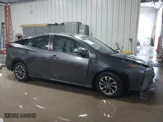 2021 Toyota Prius L Eco with VIN JTDKAMFU9M3132587, listed as a IAAI auction lot 41637275 with 84,203 mi miles. Bid and sale history available at carsss.com. Image 13.
