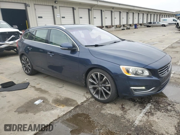 2015 Volvo V60 T5 Drive-E Premier Plus z VIN YV140MEC6F1213575, wystawiony jako Copart lot #52224865 z przebiegiem 78 702 mil mil oraz Szkoda całkowita • Salvage title. Historia ofert i sprzedaży dostępna na DreamBid. Obrazek 4.