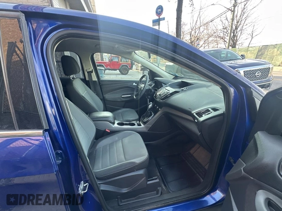 2013 Ford Escape SE with VIN 1FMCU9GX9DUA32769, listed as a Copart auction lot 46907285 with 125,348 mi miles and Clean Title. Bid and sale history available at DreamBid. Image 5.