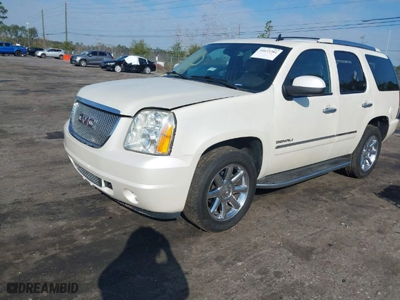 2012 GMC Yukon Denali with VIN 1GKS1EEF5CR156426, listed as a IAAI auction lot 41673781 with 147,022 mi miles. Bid and sale history available at carsss.com. Image 2.