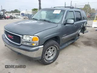 2001 GMC Yukon SLE z VIN 1GKEC13T91R205942, wystawiony jako IAAI lot #42207894 z przebiegiem 265 808 mil mil oraz . Historia ofert i sprzedaży dostępna na DreamBid. Obrazek 2.