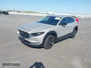 2024 Mazda CX-30 2.5 S Select Sport with VIN 3MVDMBBM4RM689518, listed as a IAAI auction lot 42021872 with 5,041 mi miles. Bid and sale history available at carsss.com. Image 6.