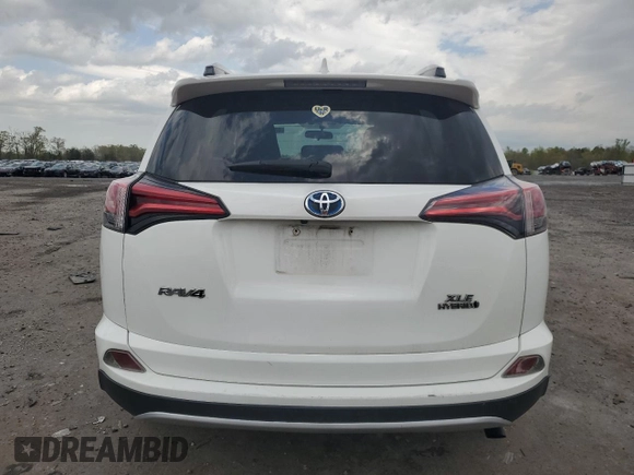 2016 Toyota RAV4 Hybrid XLE with VIN JTMRJREV0GD017557, listed as a Copart auction lot 53369355 with 271,066 mi miles and Salvage Title. Bid and sale history available at carsss.com. Image 6.