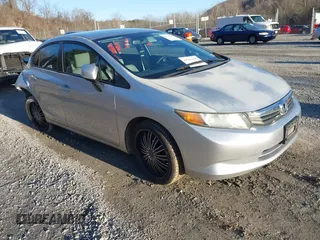 2012 Honda Civic Sdn LX with VIN 2HGFB2F57CH319433, listed as a IAAI auction lot 41536201 with 135,514 mi miles. Bid and sale history available at carsss.com. Image 1.