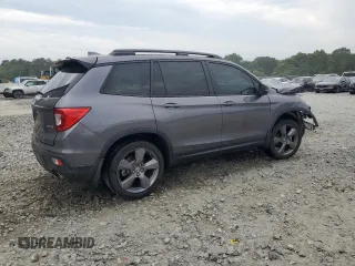 2021 Honda Passport Touring z VIN 5FNYF7H94MB005741, wystawiony jako Copart lot #57626664 z przebiegiem Nie podano mil oraz Szkoda całkowita • Salvage title. Historia ofert i sprzedaży dostępna na DreamBid. Obrazek 3.